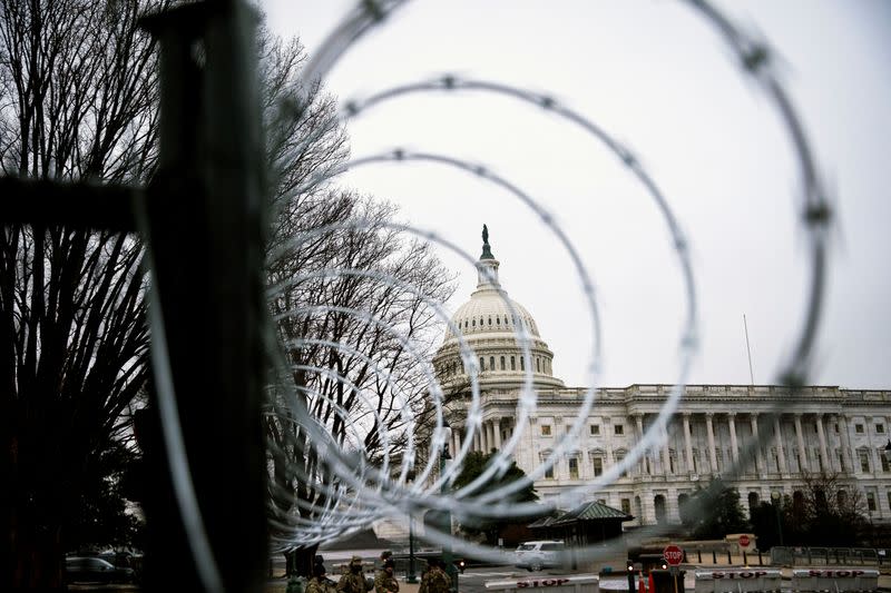 FILE PHOTO: Barbed wire surrounds the U.S. Capitol in Washington