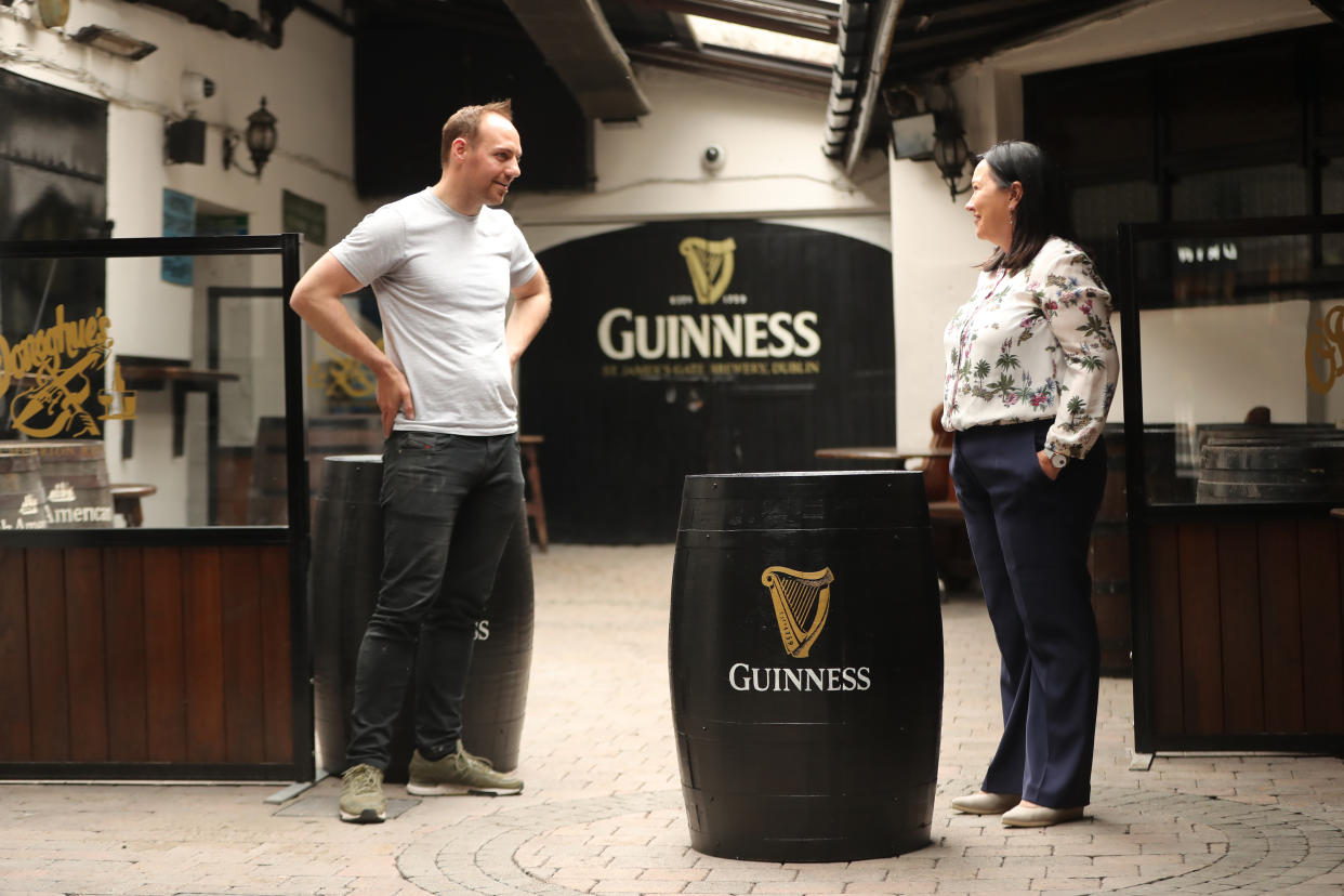 Kevin Barden and Grannie Wafer in the outdoor courtyard at O’Donoghue’s (Niall Carson/PA)