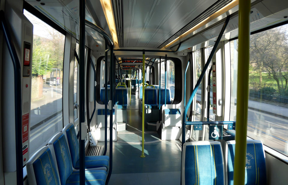 A quiet tram heading to Nottingham after Prime Minister Boris Johnson ordered pubs, restaurants, leisure centres and gyms across the country to close as the Government announced unprecedented measures to cover the wages of workers who would otherwise lose their jobs due to the coronavirus outbreak. Photo credit should read: James Warwick/EMPICS Entertainment