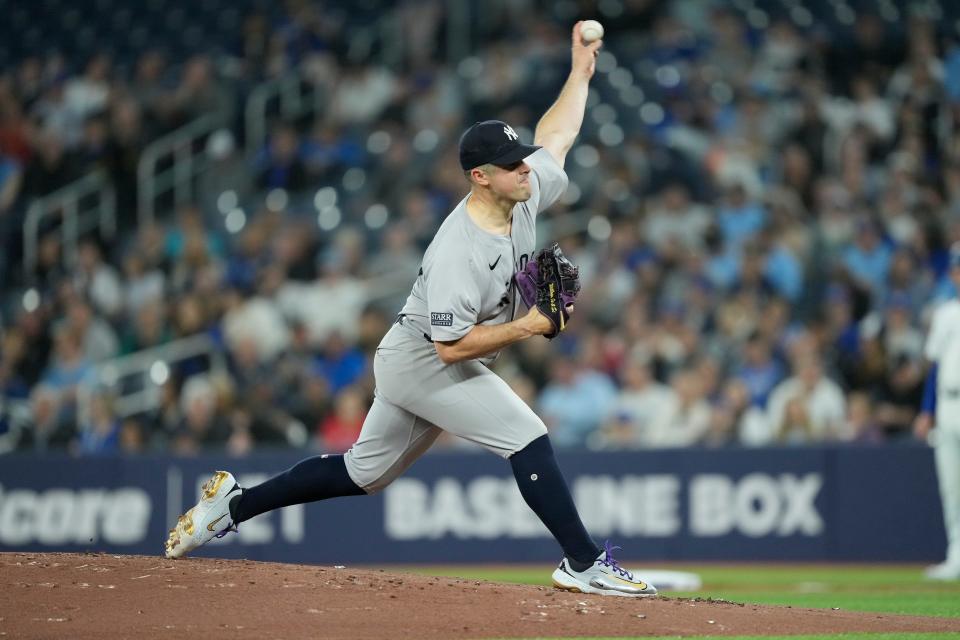 Apr 16, 2024; Toronto, Ontario, CAN; New York Yankees starting pitcher Carlos Rodon (55) pitches to the Toronto Blue Jays during the first inning at Rogers Centre. Mandatory Credit: John E. Sokolowski-USA TODAY Sports