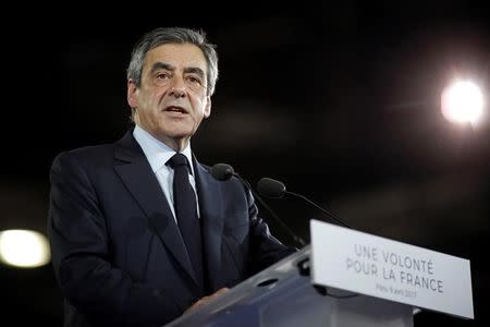 Francois Fillon, former French Prime Minister, member of the Republicans political party and 2017 French presidential election candidate of the French centre-right, attends a political rally in Paris, France, April 9, 2017. REUTERS/Benoit Tessier