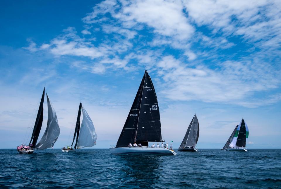 Boats take off at the start of the the Port Huron-to-Mackinac on Lake Huron in 2019. The annual race is in July.