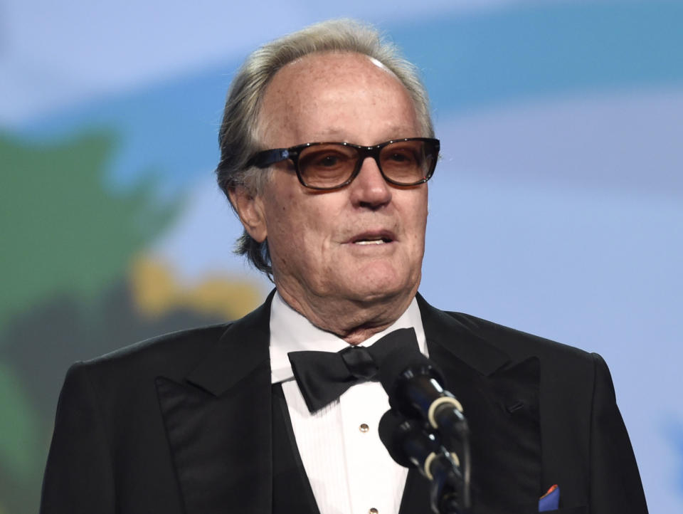 Peter Fonda presents the Desert Palm achievement award at the Palm Springs International Film Festival.  