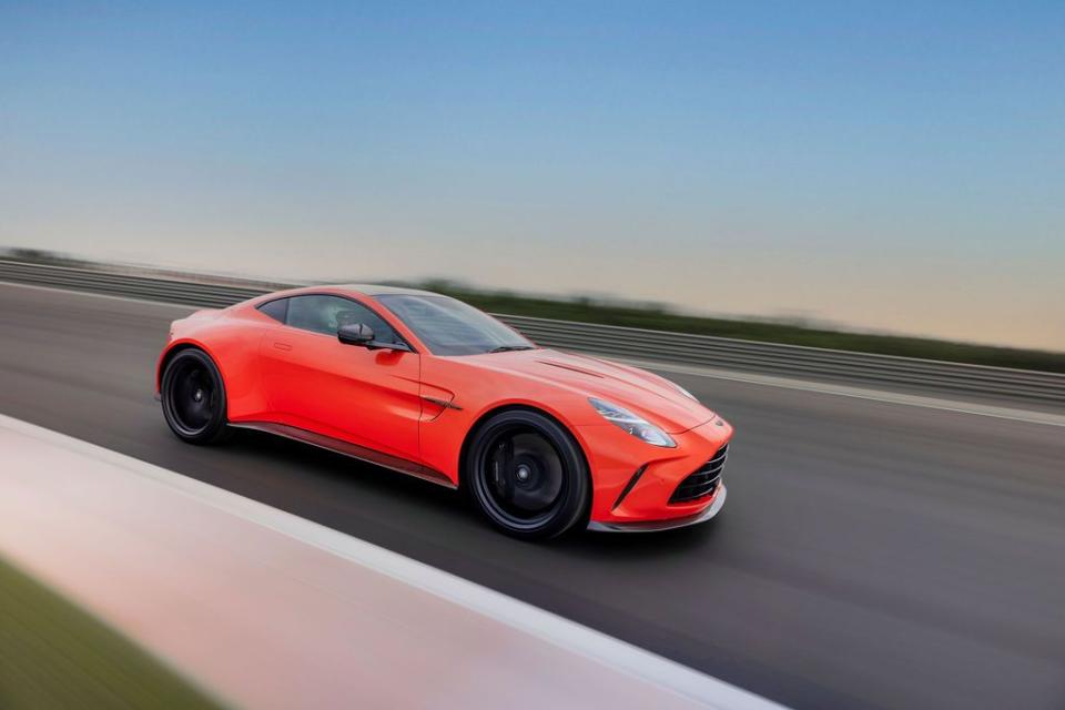 a red sports car on a road