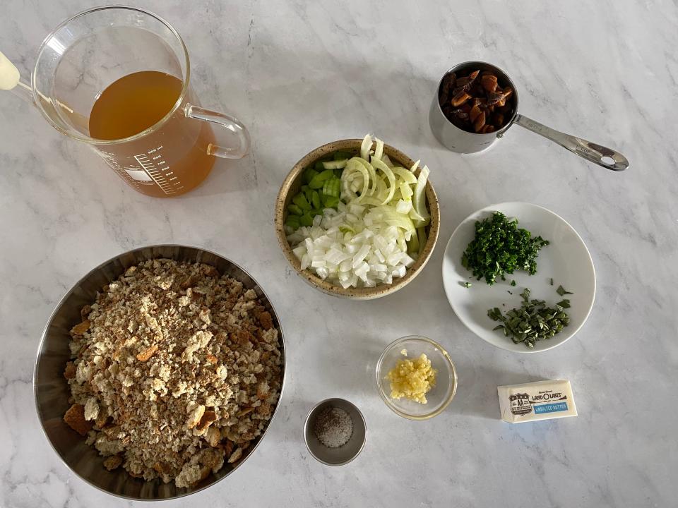 The ingredients for Sunny Anderson's stuffing laid out on white counter