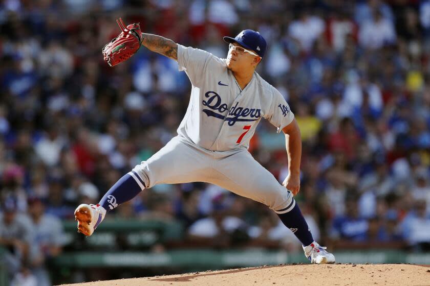 Los Angeles Dodgers pitcher Julio Urias delivers against the Boston Red Sox on Aug. 26, 2023, in Boston.