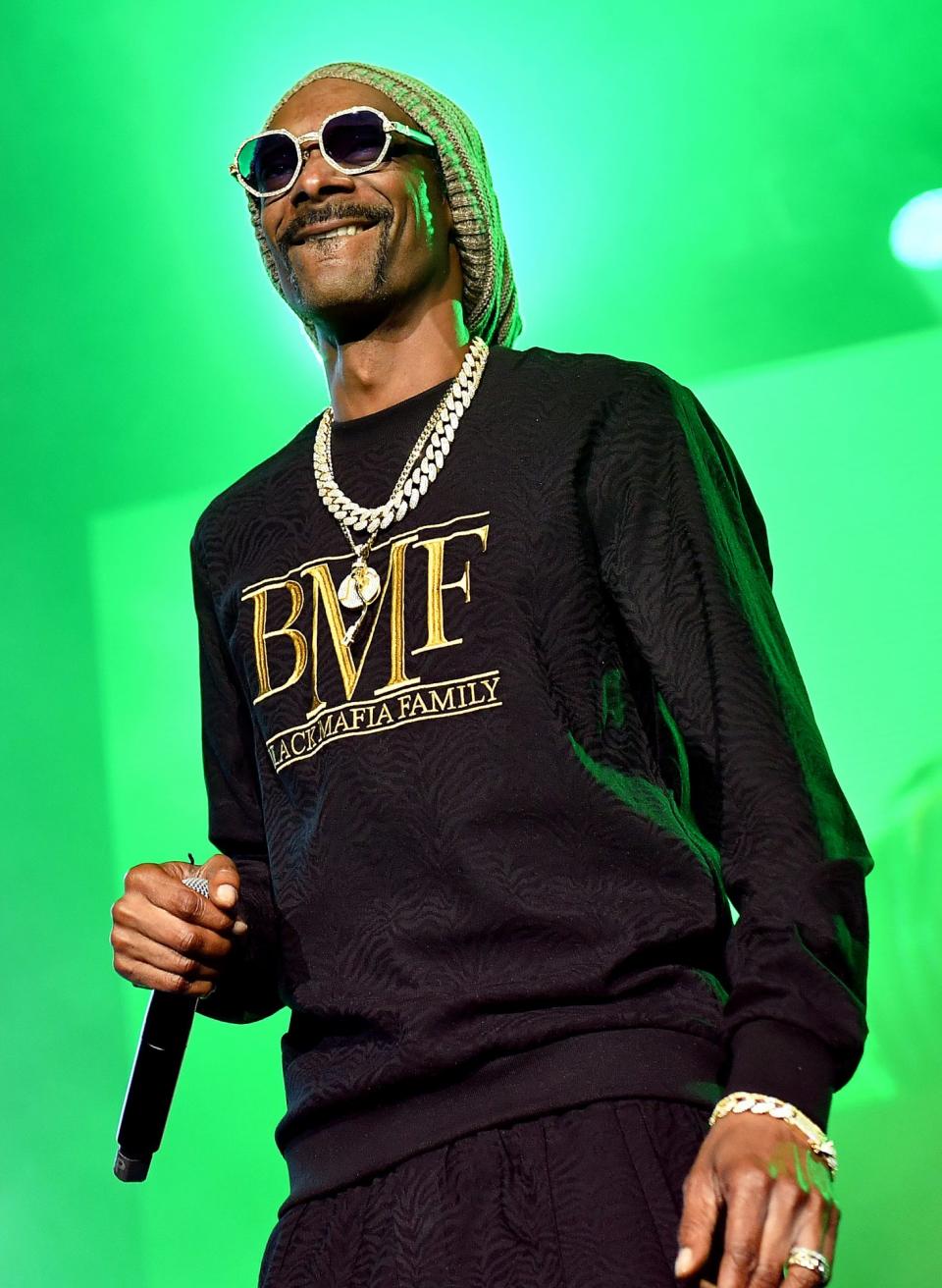 <p>Snoop Dogg performs at the world premiere screening and concert for Starz's new series <em>BMF</em> on Sept. 23 at Cellairis Amphitheatre in Atlanta. </p>