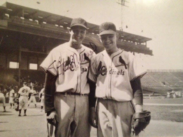 Eddie Nietopski poses with baseball legend Stan Musial at Braves Field in Boston in 1951