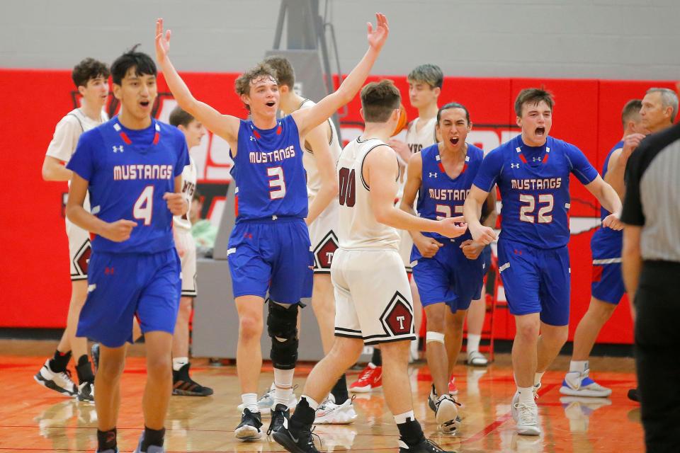 Fort Cobb-Broxton's Simeon Collins (4), Kray Rogers (3), Ian Taylor (33) and Blayke Nunn (22) celebrate during a Class B boys state basketball tournament quarterfinal game between Fort Cobb-Broxton and Mountain View-Gotebo in Washington, Okla., Okla., Thursday, March 3, 2022. 