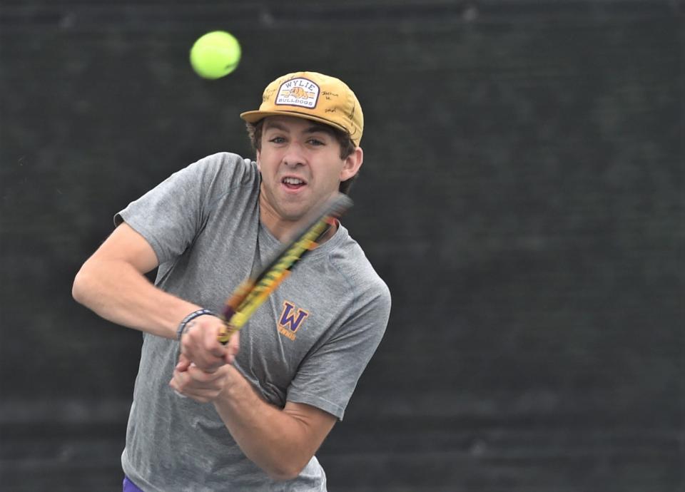 Wylie's Grant Bristow eyes the ball in his boys doubles match against Austin LASA's Ted Gershon and William Gu. Gershon and Gu beat Bristow and Conner Brown 6-1, 6-3 in the state quarterfinal match at the Class 5A state tournament Tuesday at Northside Tennis Center in Helotes.