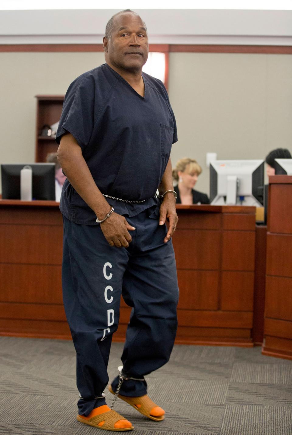 <p>O.J. Simpson returns to the witness stand to testify after a break during an evidentiary hearing in Clark County District Court in Las Vegas, Nev., May 15, 2013. (Photo: Julie Jacobson, Pool/AP) </p>