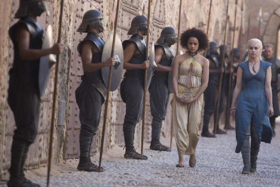 Nathalie Emmanuel and Emilia Clarke in the "Game of Thrones" Season 3 episode, "Walk of Punishment."