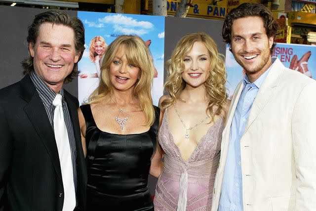 <p>Vince Bucci/Getty</p> Kurt Russell, Goldie Hawn, Kate Hudson, and Oliver Hudson in 2004