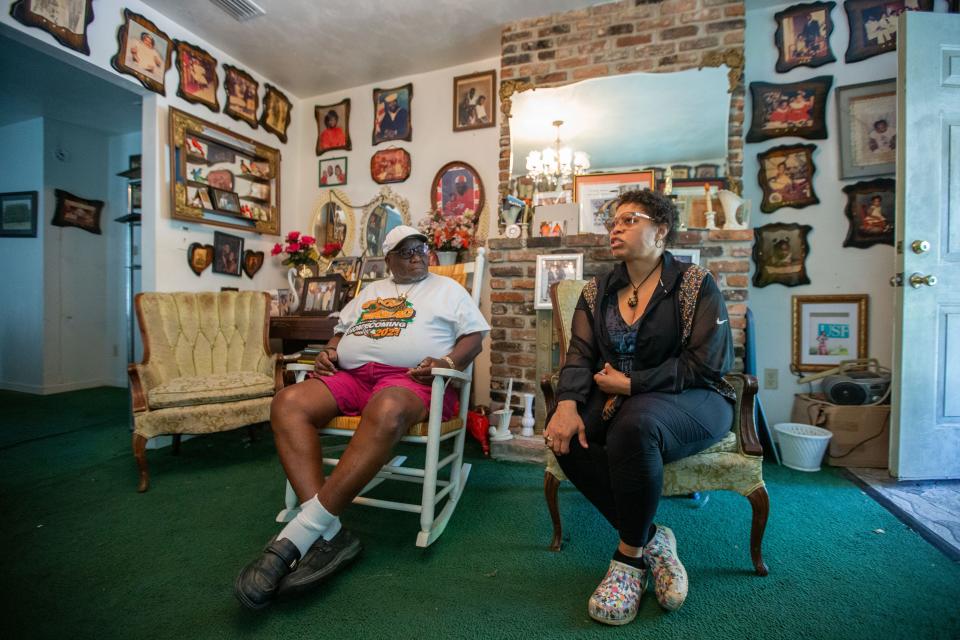 O'Neil "Boss Man" Jackson Jr., left, and his tenant Karen Robinson talk about the changes they are experiencing in Frenchtown and how it impacts them Thursday, April 4, 2024.