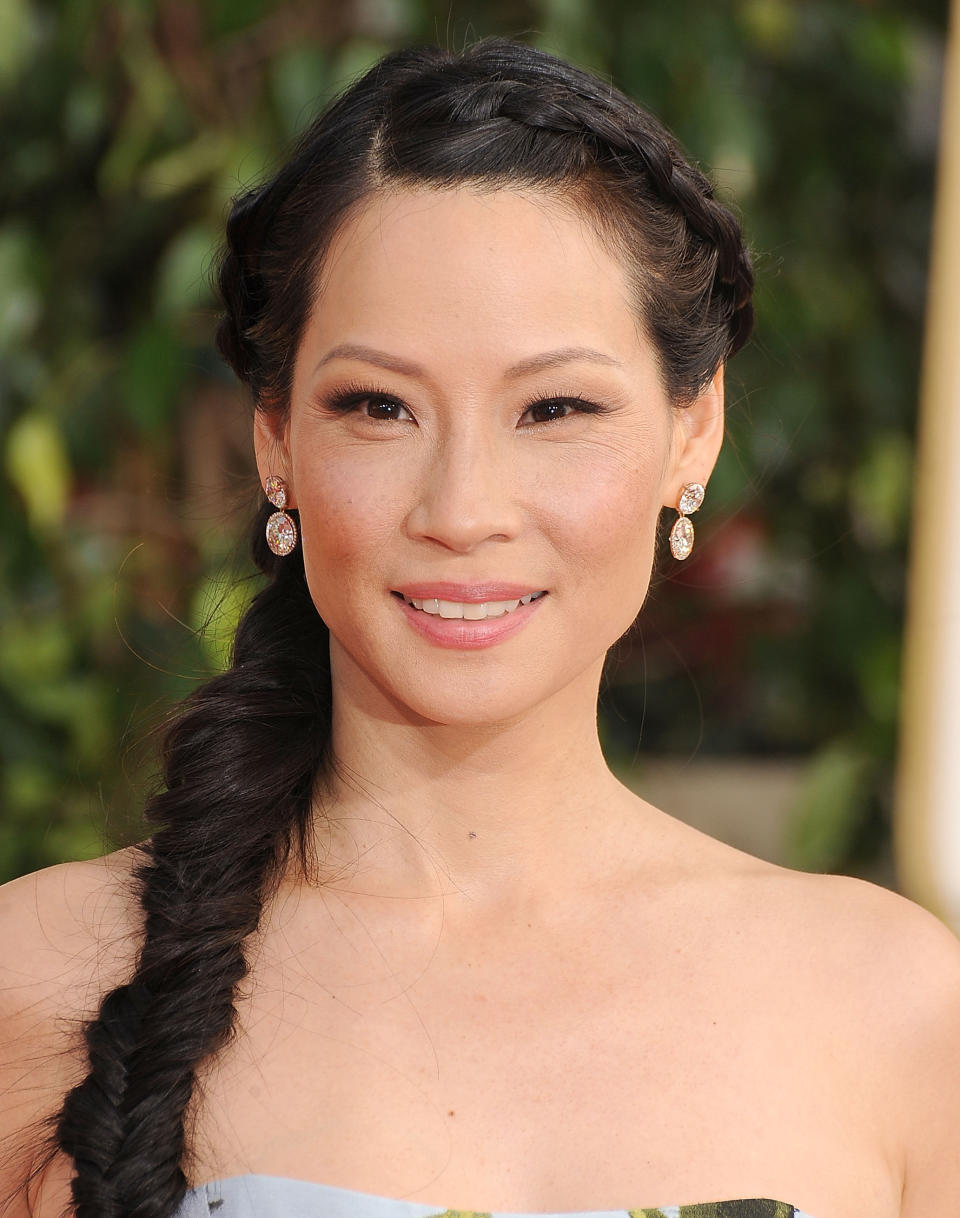 Lucy Liu with a fishtail braid, which is a style of braids for thin hair