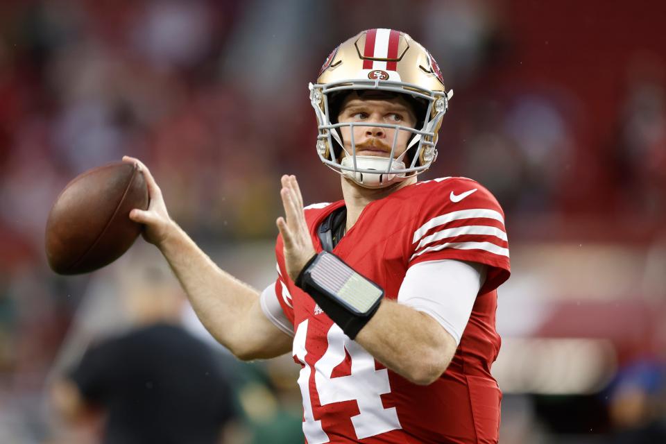 Sam Darnold #14 of the San Francisco 49ers warms up before the NFC Divisional Playoffs against the Green Bay Packers at Levi's Stadium on January 20, 2024 in Santa Clara, California.