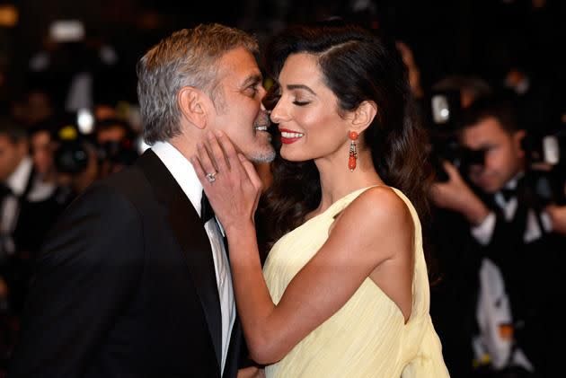 The couple are never afraid of a little PDA on the red carpet. photo: Getty Images