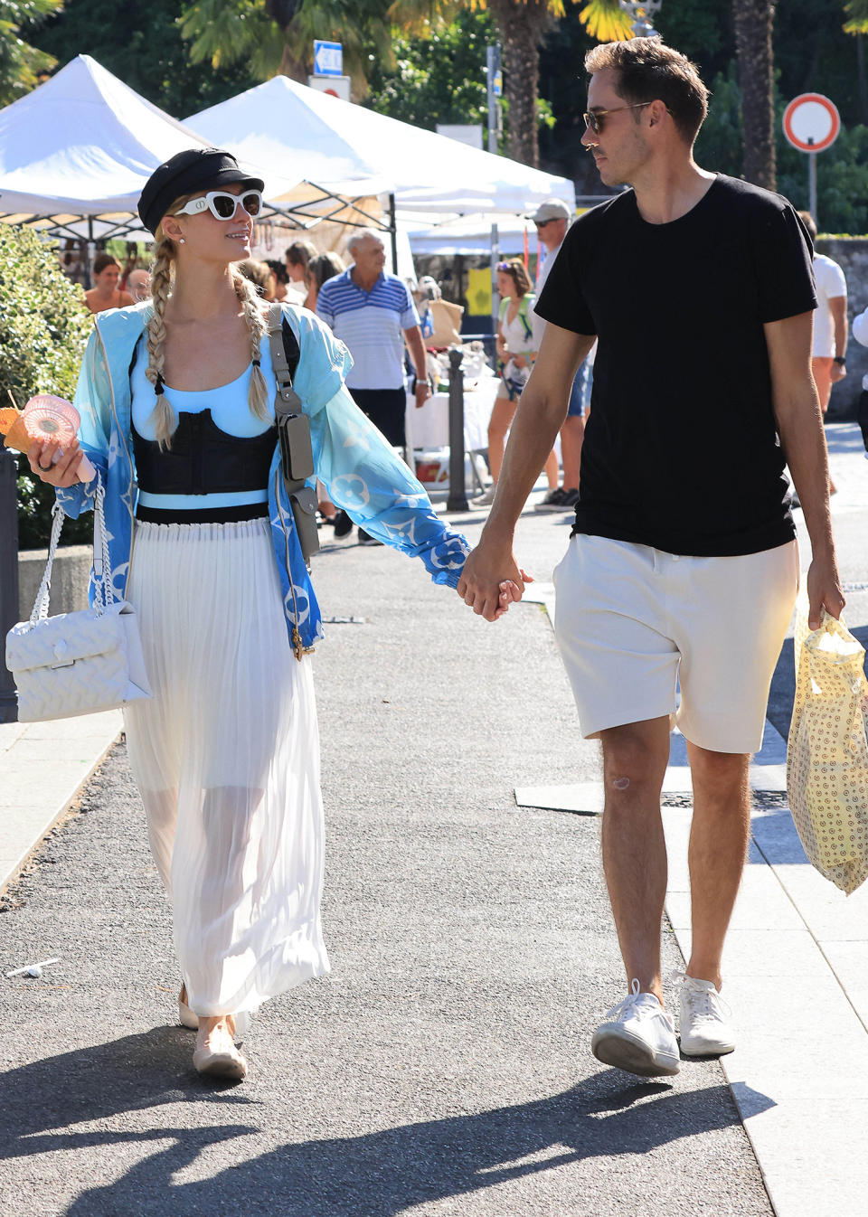 <p>Paris Hilton and Carter Reum get lost in each other's eyes during a walk through Lake Como, Italy, on Aug. 4. </p>