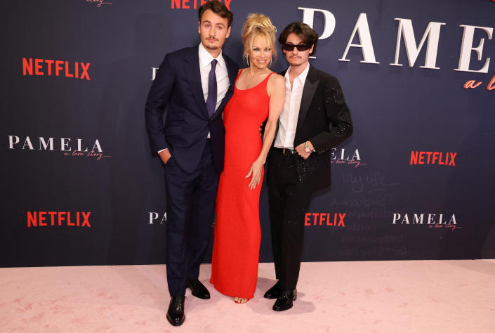 Actor Pamela Anderson, and her sons Brandon Thomas Lee and Dylan Jagger Lee attend a premiere for the documentary 