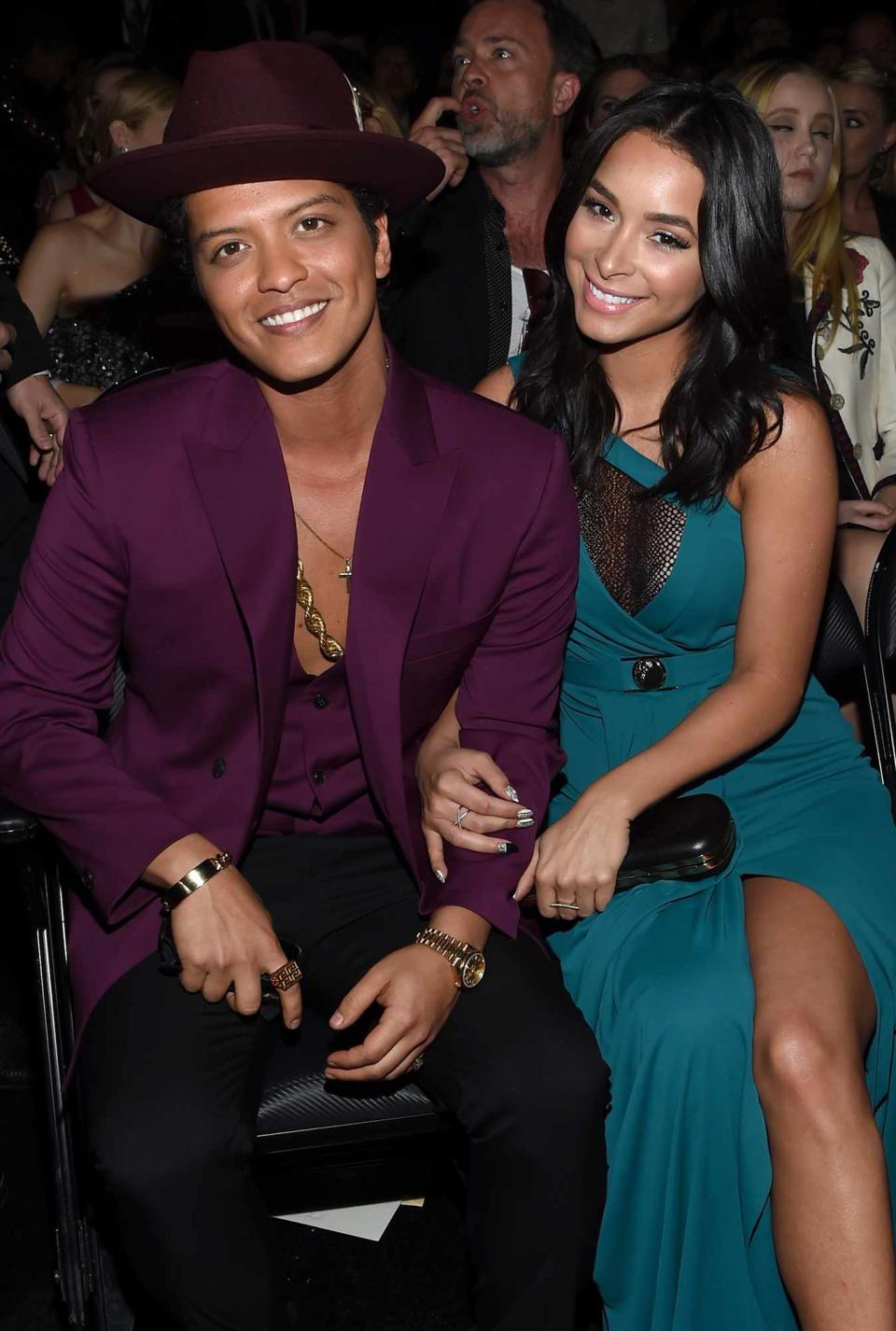 Bruno Mars (L) and Jessica Caban attend The 58th GRAMMY Awards at Staples Center on February 15, 2016 in Los Angeles, California