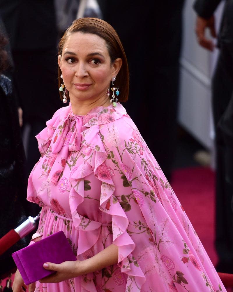 Maya Rudolph in a caped gown at the Oscars.