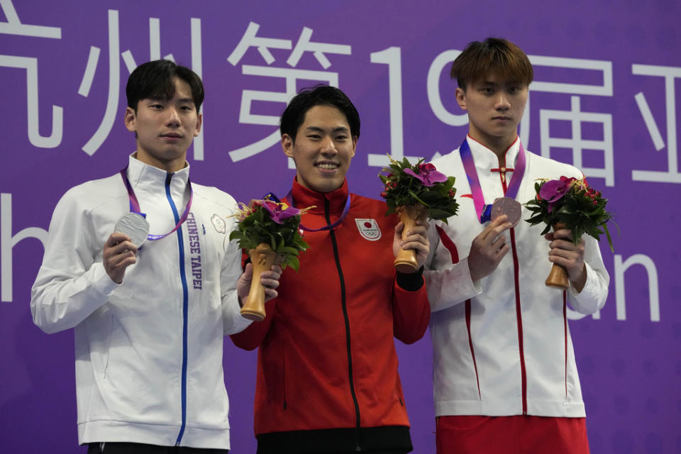 （王冠閎在杭州亞運男子200公尺蝶式項目獲得銀牌。／美聯社）