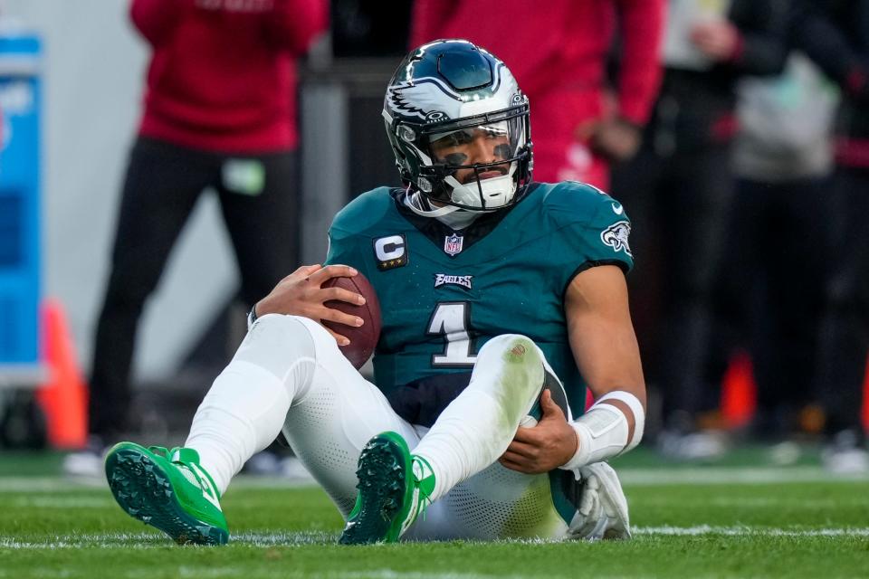 Philadelphia Eagles quarterback Jalen Hurts reacts after being sacked by the Arizona Cardinals during the second half of an NFL football game, Sunday, Dec. 31, 2023, in Philadelphia.