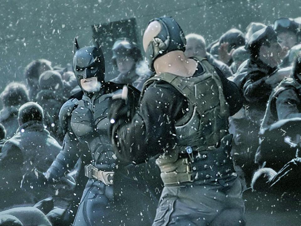 Christian Bale as Batman and Tom Hardy as Bane in ‘The Dark Knight Rises’ (Warner Bros)