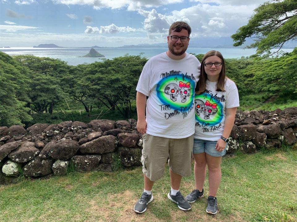 matt and his wife smiling in matching t shirts in hawaii