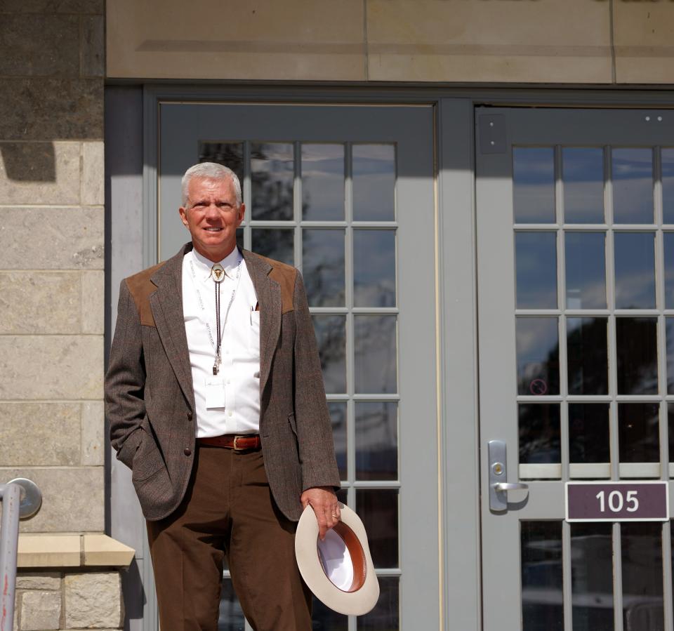 Federal Magistrate Judge Mark L. Carman stands on the front steps of the federal court building in Mammoth Hot Springs at Yellowstone National Park.