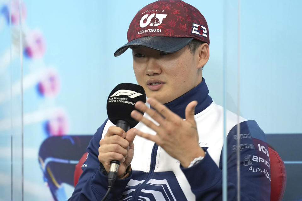 AlphaTauri driver Yuki Tsunoda of Japan speaks during a news conference, ahead of the Japanese Formula One Grand Prix at the Suzuka Circuit in Suzuka, central Japan, Thursday, Oct. 6, 2022. (AP Photo/Eugene Hoshiko)