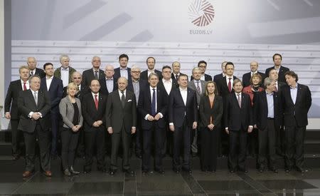 European Union Foreign Ministers pose for the media during their informal European Union Ministers of Foreign Affairs meeting (Gymnich) in Riga March 6, 2015. REUTERS/Ints Kalnins