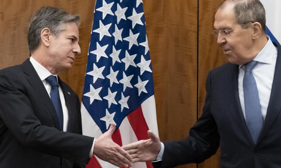 Secretary of State Antony Blinken, left, greets Russian foreign minister Sergei Lavrov before their meeting on Friday.