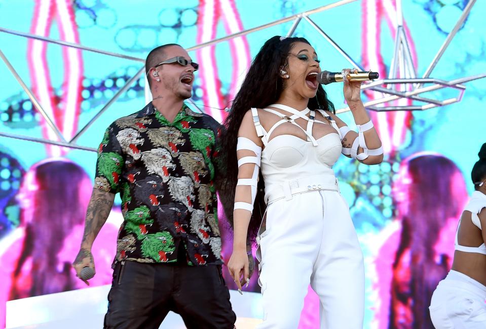 INDIO, CA - APRIL 22:  (L-R) J Balvin and Cardi B perform onstage during the 2018 Coachella Valley Music And Arts Festival at the Empire Polo Field on April 22, 2018 in Indio, California.  (Photo by Kevin Winter/Getty Images for Coachella) ORG XMIT: 775141426 ORIG FILE ID: 950143374