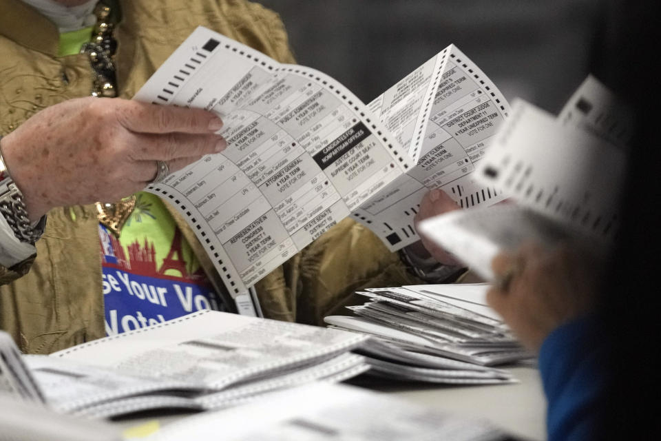 Election workers process ballots at the Clark County Election Department, Thursday, Nov. 10, 2022, in Las Vegas. (AP Photo/Gregory Bull)