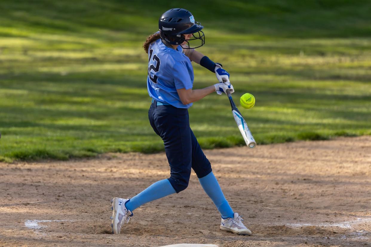 Emma Weaver (12) connects with a pitch in the seventh inning during Central Valley's WPIAL Class 3A matchup with Beaver Falls Tuesday afternoon.