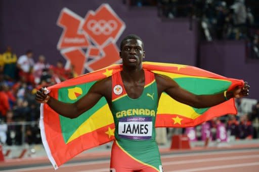 Grenada's Kirani James celebrates after winning the 400m final at the athletics event of the London 2012 Olympic Games, on August 6. Jubilation erupted across Grenada when James earned the tiny island its first ever Olympic medal