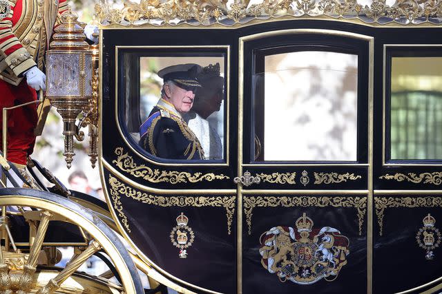 <p>Neil Mockford/GC Images</p> King Charles and Queen Camilla attend the State Opening of Parliament on Nov. 7, 2023