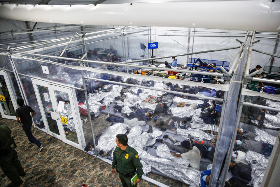 Minors lie inside a pod at the Donna Department of Homeland Security holding facility (Dario Lopez-Mills / AP file)