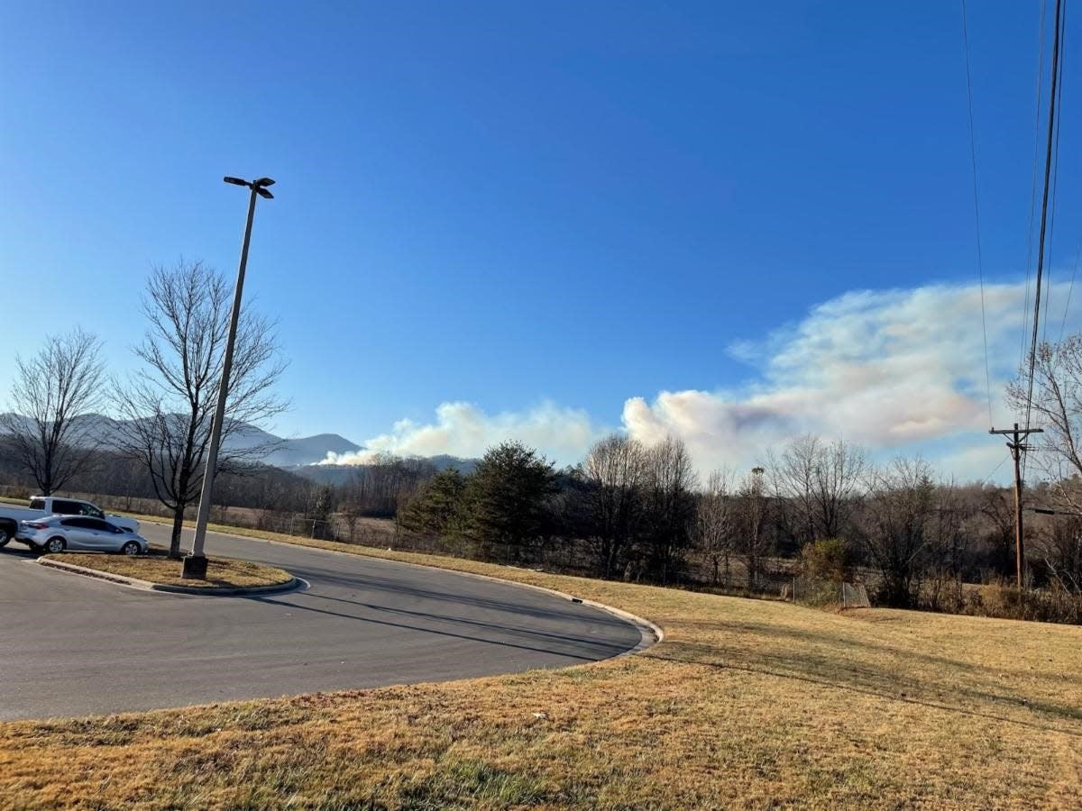 Smoke plumes from the Clear Creek (left) and Locust Cove #2 wildfires as seen from Marion, NC on Nov. 30, 2023.