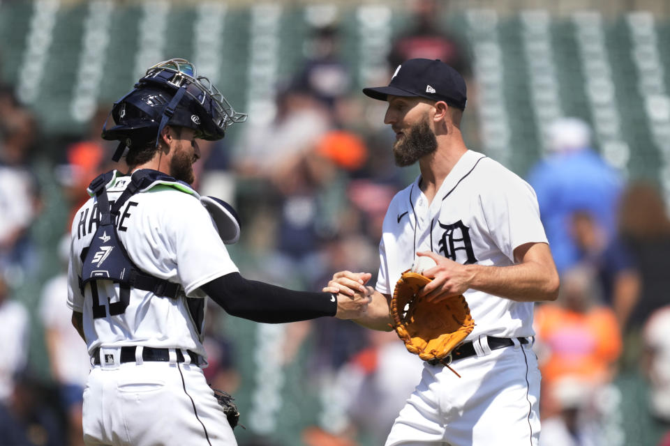 Detroit Tigers catcher Eric Haase (13) greets relief pitcher Chasen Shreve after the ninth inning of a baseball game against the Oakland Athletics, Thursday, July 6, 2023, in Detroit. (AP Photo/Carlos Osorio)