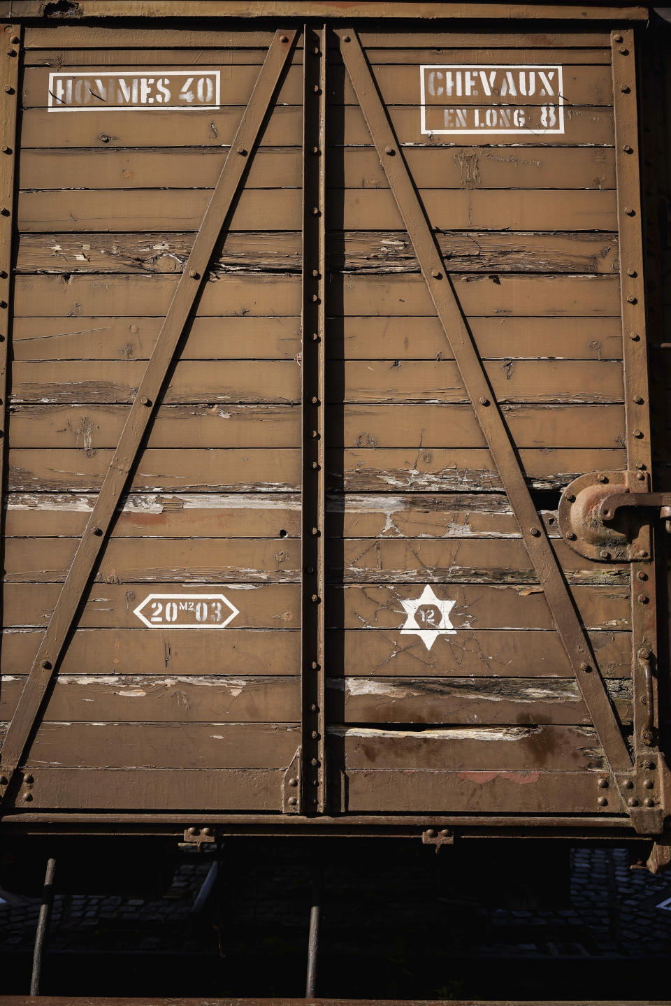A train car symbolizing the Drancy camp, at the Shoah memorial, is photographed Tuesday, July 12, 2022 in Drancy, outside Paris. The Paris mayor and head of the French Holocaust Memorial will mark the 80th anniversary of the round-up of the Vel d'Hiv, the biggest Nazi roundup of Jews in France, visiting the site used as an internment camp during World War II for tens of thousands of people who were then sent on to Auschwitz and other death camps. (AP Photo/Thomas Padilla)