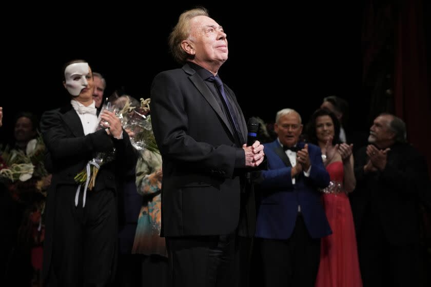 Andrew Lloyd Webber onstage with the cast of "The Phantom of the Opera"