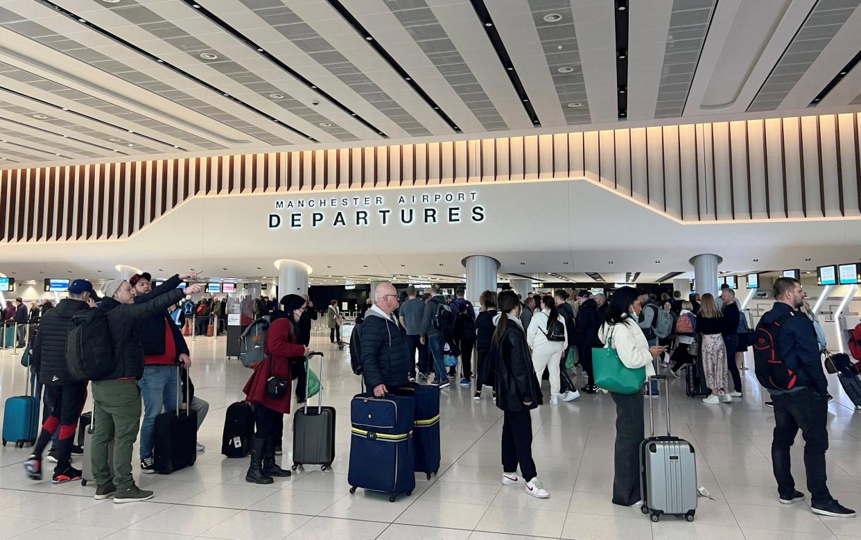 Manchester Airport has been plagued by long check-in delays and baggage handling snafus - PHIL NOBLE