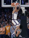 Kansas State forward Keyontae Johnson (11) dunks in overtime of a Sweet 16 college basketball game against Michigan State in the East Regional of the NCAA tournament at Madison Square Garden, Thursday, March 23, 2023, in New York. (AP Photo/Adam Hunger)