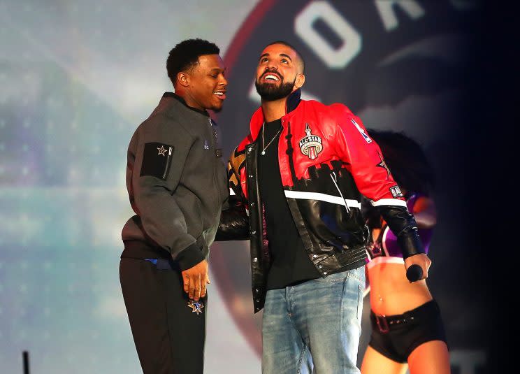 <em>Kyle Lowry of the Toronto Raptors and the Eastern Conference and rapper Drake look on during introductions for the NBA All-Star Game 2016 at the Air Canada Centre on February 14, 2016 in Toronto, Ontario. (Photo by Elsa/Getty Images)</em>