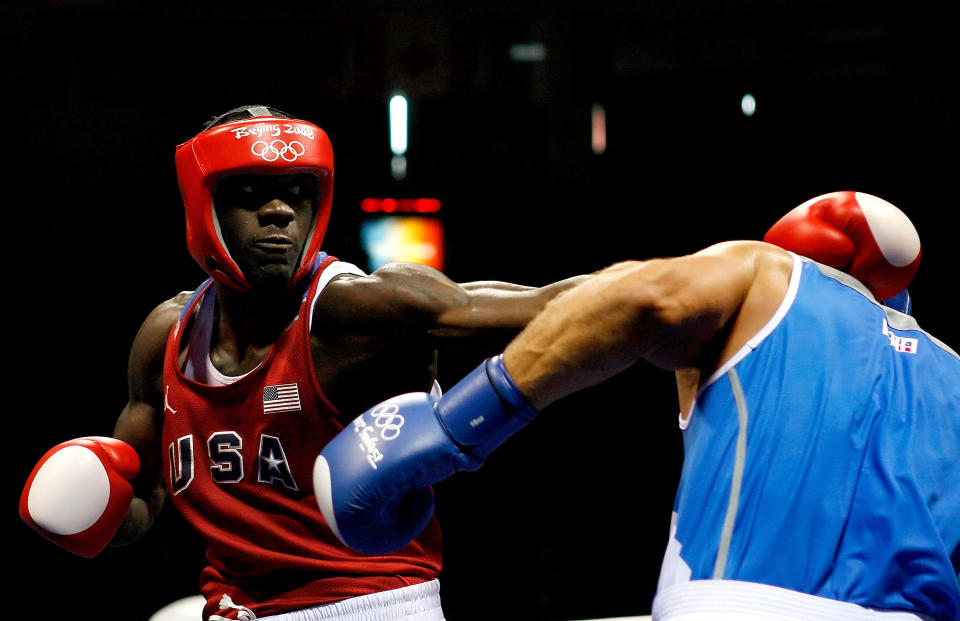 BEIJING - AUGUST 22: Clemente Russo of Italy (blue) fights Deontay Wilder of the United States (red) in the Men's Heavy (91kg) Semifinal at the Workers' Indoor Arena on Day 14 of the Beijing 2008 Olympic Games on August 22, 2008 in Beijing, China. Russo won the bout. (Photo by Harry How/Getty Images)