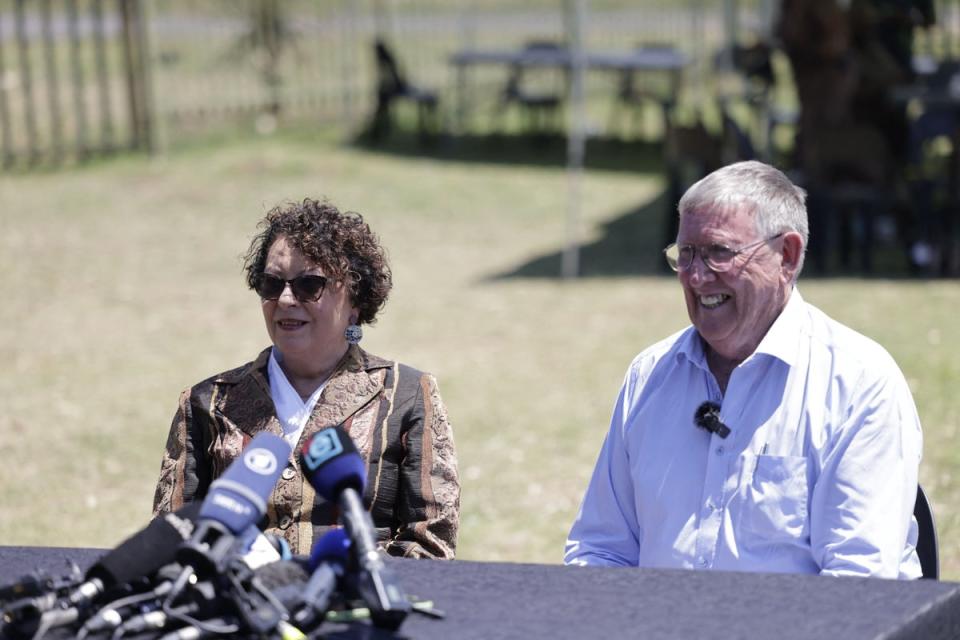 Rob Matthews, who is a spokesperson for Reeva Steenkamp’s mother June, and advocate Annade Theart-Hofmeyr speak to the media after the parole board hearing (AFP via Getty Images)