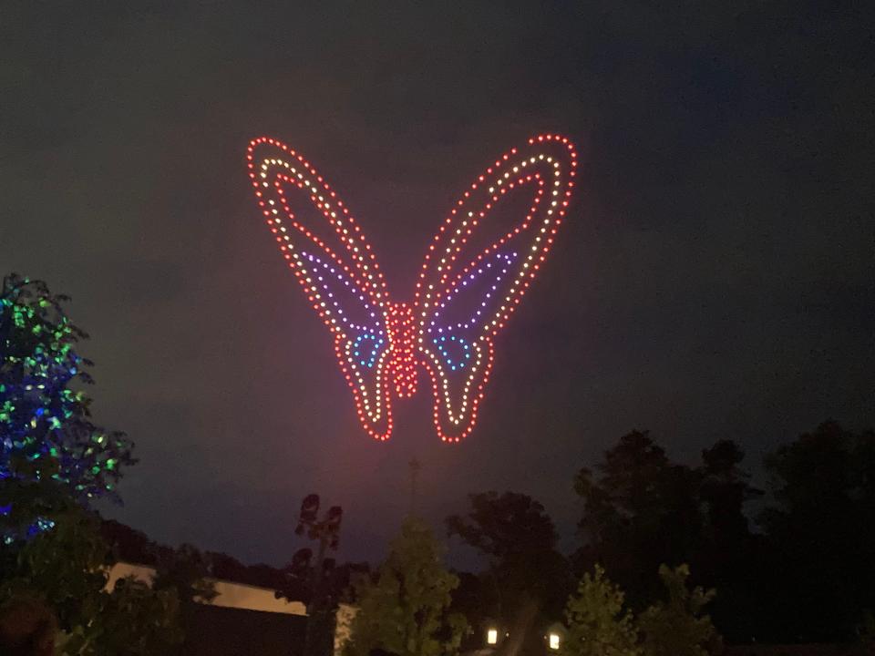 Drones make the shape of a butterfly in the night sky at Dollywood