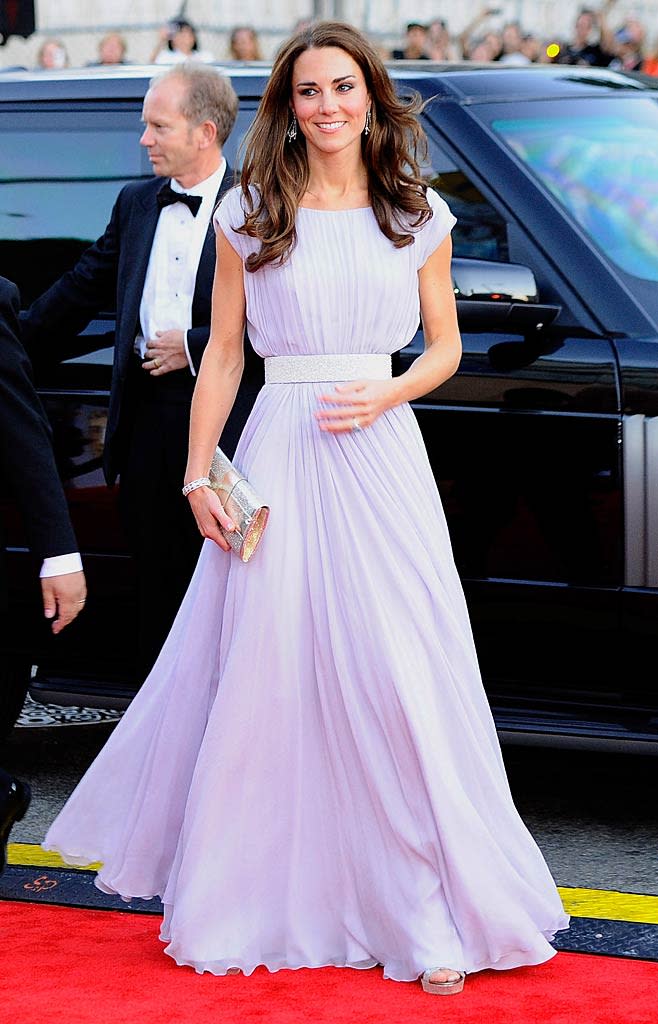 All eyes were on Catherine, Duchess of Cambridge as she arrived at her very first Hollywood red carpet event -- the BAFTA Brits to Watch soiree -- in a pretty chiffon Alexander McQueen gown that accentuated her tiny waist. Prince William is a lucky guy, eh? Kevork Djansezian/<a href="http://www.gettyimages.com/" rel="nofollow noopener" target="_blank" data-ylk="slk:GettyImages.com;elm:context_link;itc:0;sec:content-canvas" class="link ">GettyImages.com</a> - July 9, 2011